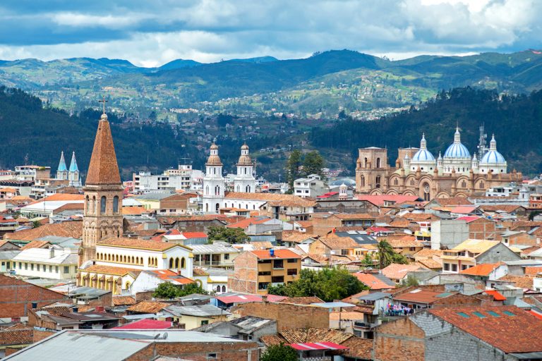 View of the city of Cuenca, Ecuador, with it's many churches and rooftops, on a cloudy day